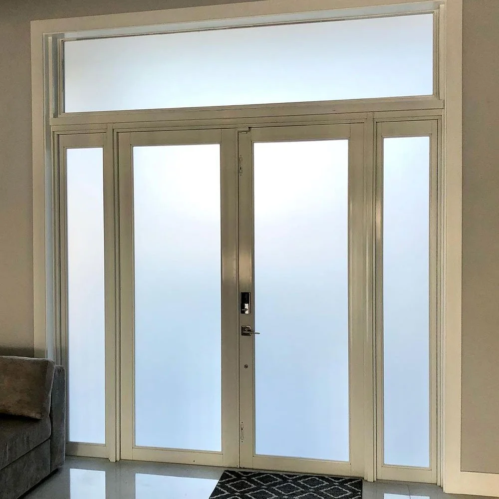 White frost decorative privacy window film installed on residential property