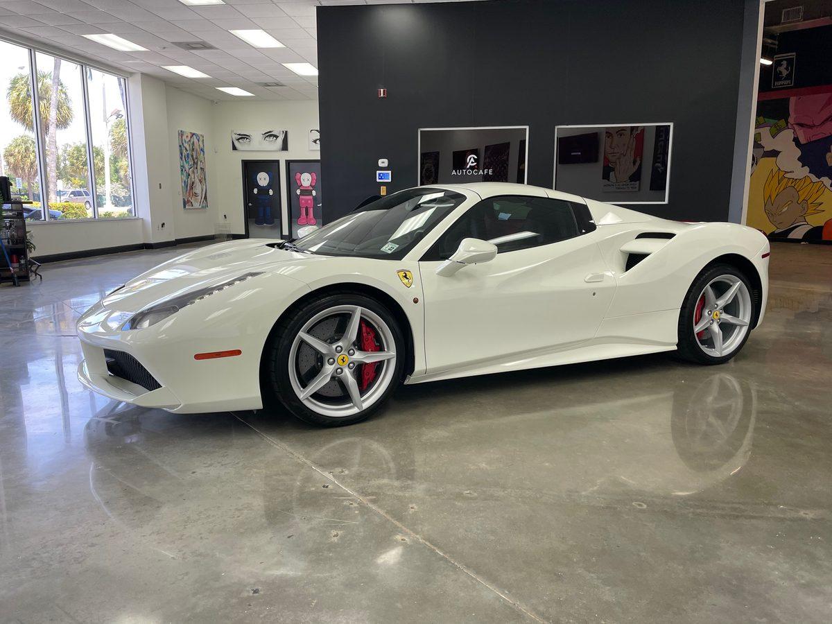White Ferrari 488 with professional ceramic window tint installation